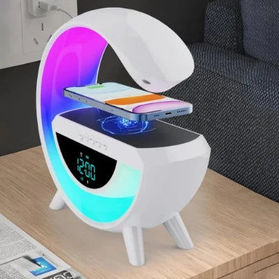 Wireless phone charger speaker